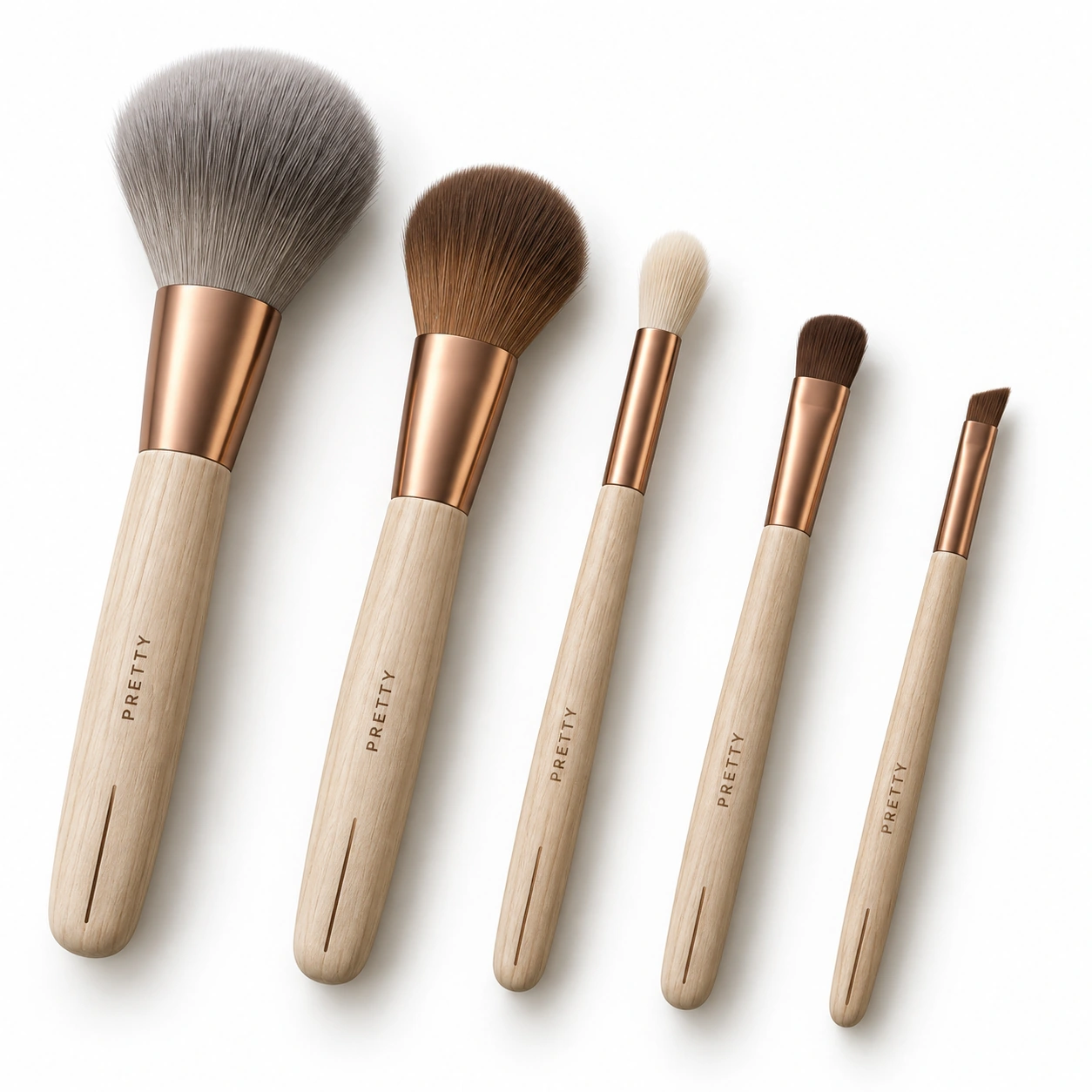 Wood & Copper: Five brush profiles with pale wood-grain handles and copper-tone ferrules. A coordinated everyday collection with understated marking details. Original design concept.