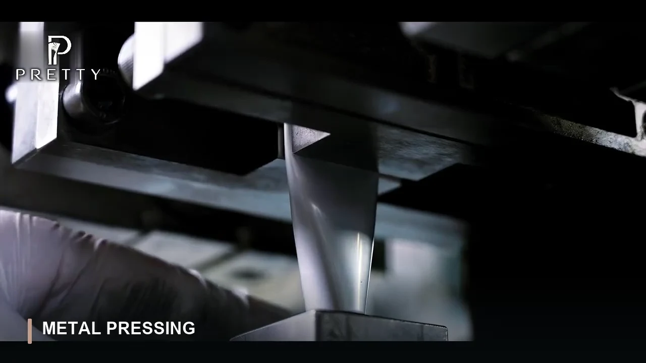 Shaping the metal components — still from the PRETTY factory film
