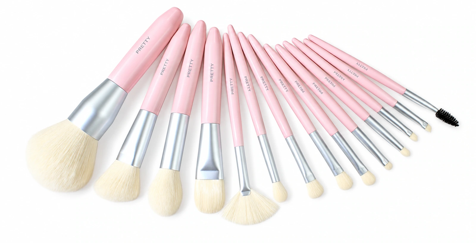 Pink-handle collection with silver-tone ferrules and pale heads, produced brush design