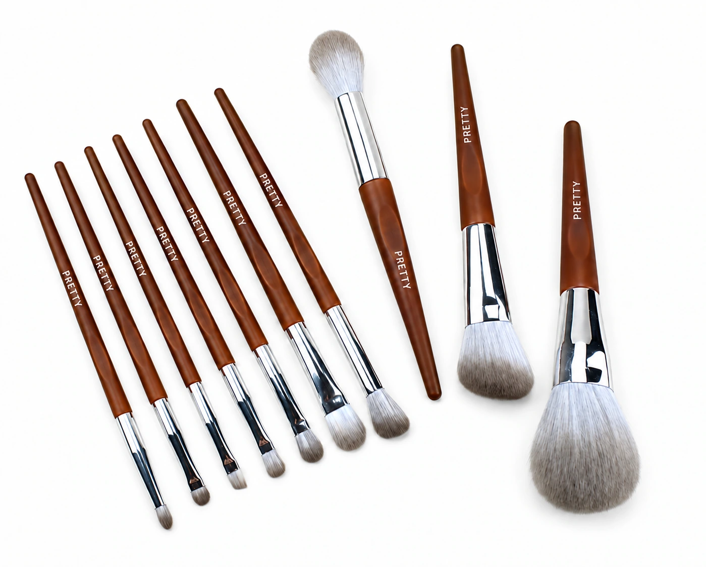 Brown-handle collection with silver-tone ferrules and gray heads, produced brush design