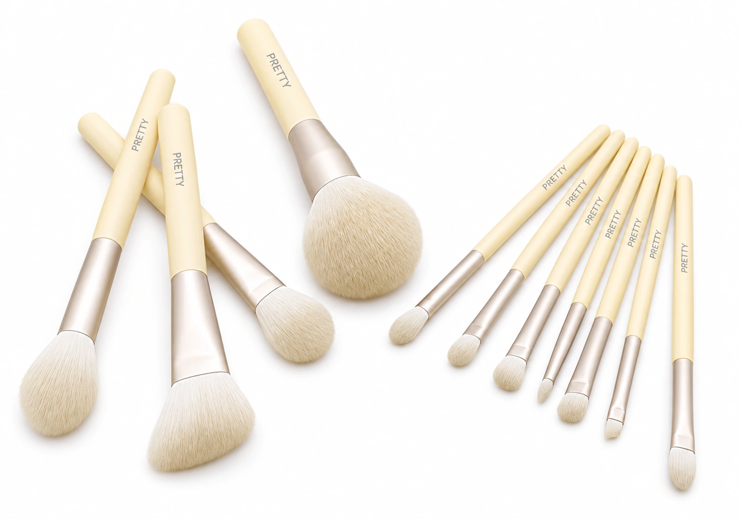 Ivory-handle eleven-brush flat lay, produced brush design