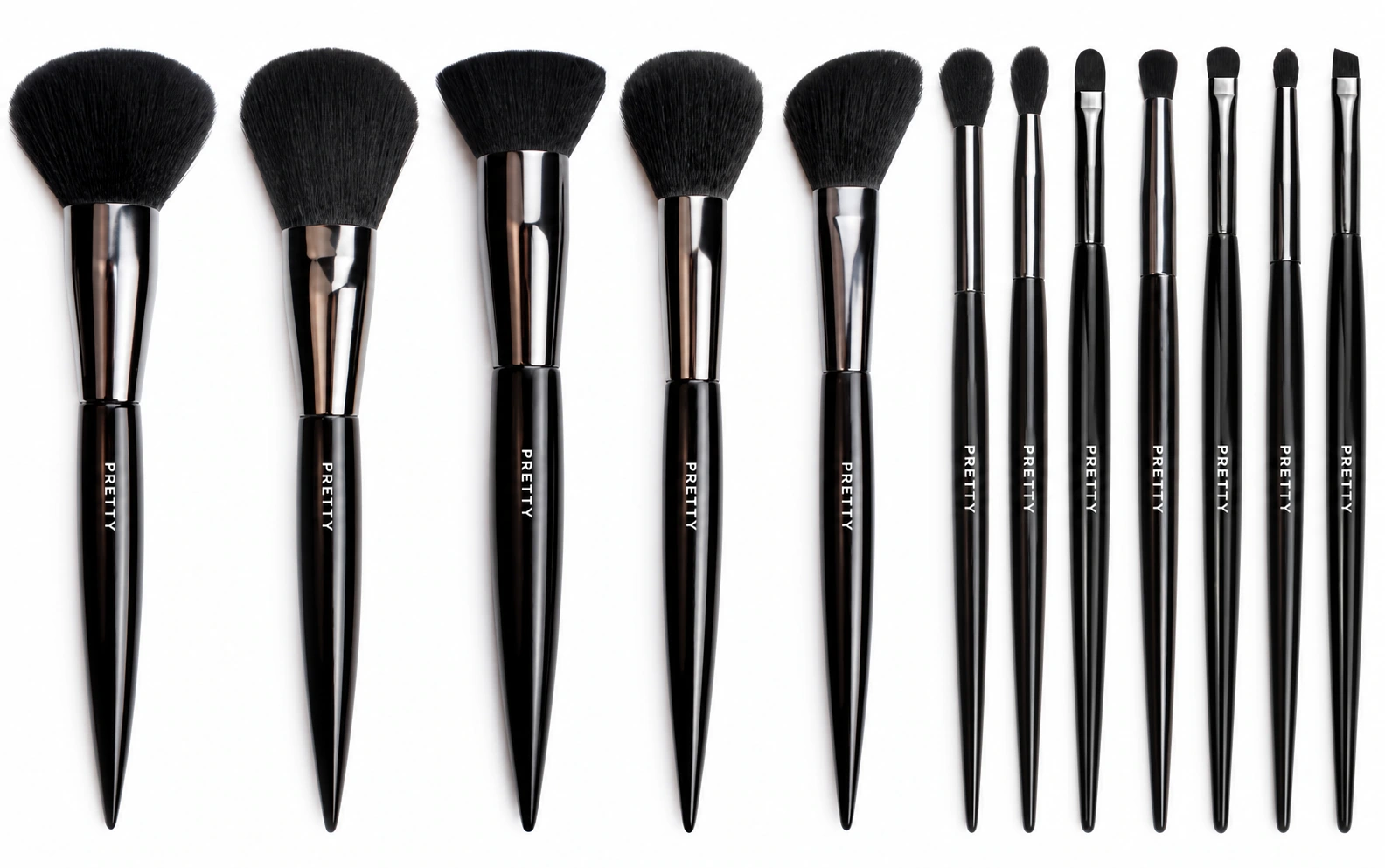 Black pointed handles and reflective ferrule brush lineup, produced brush design