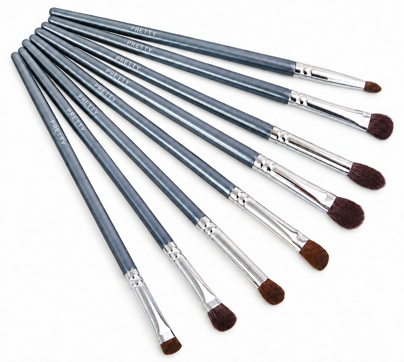 Slate-blue small-brush collection with silver-tone ferrules, produced brush design