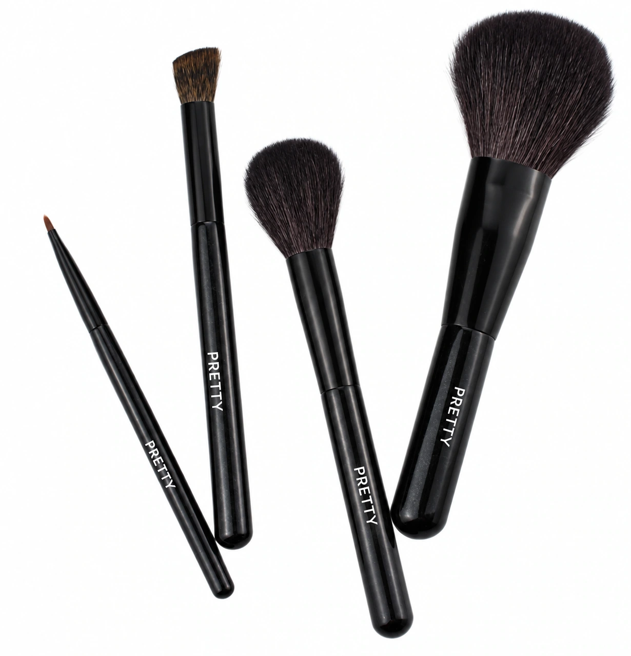 Four black-handle brushes with varied head sizes, produced brush design