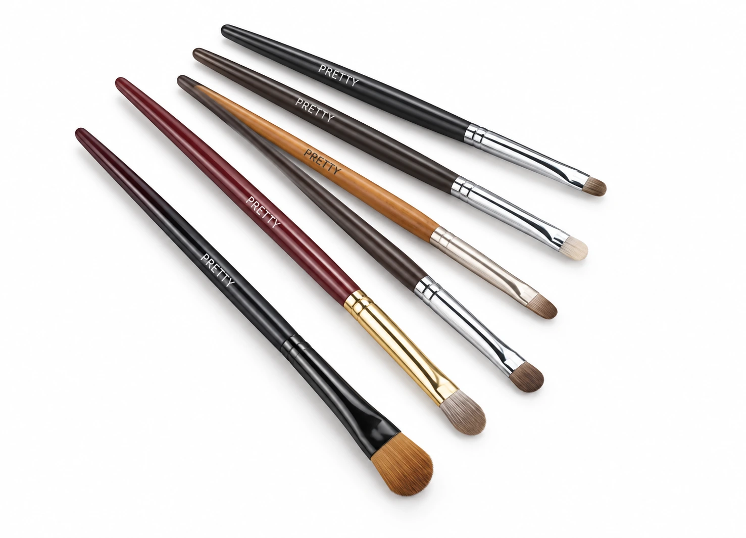 Six small brushes with mixed dark and brown handles, produced brush design