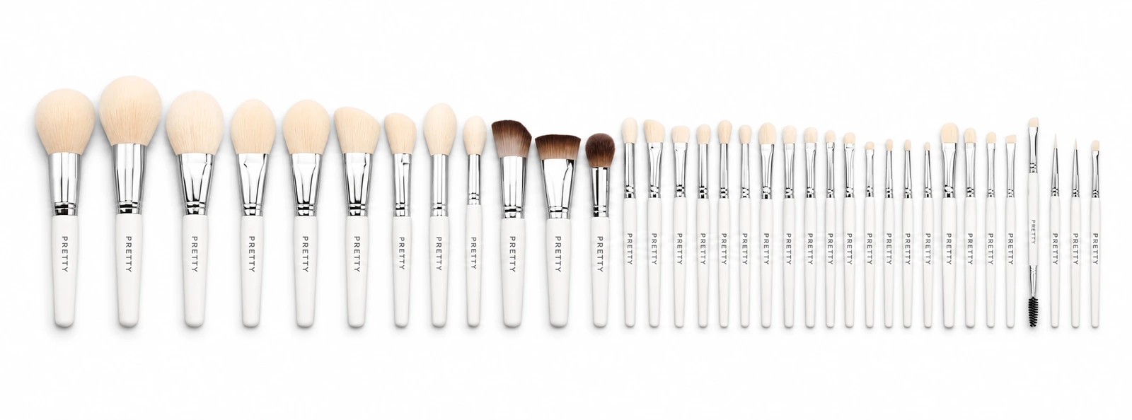 White-handle thirty-five-brush lineup with silver-tone ferrules, produced brush design
