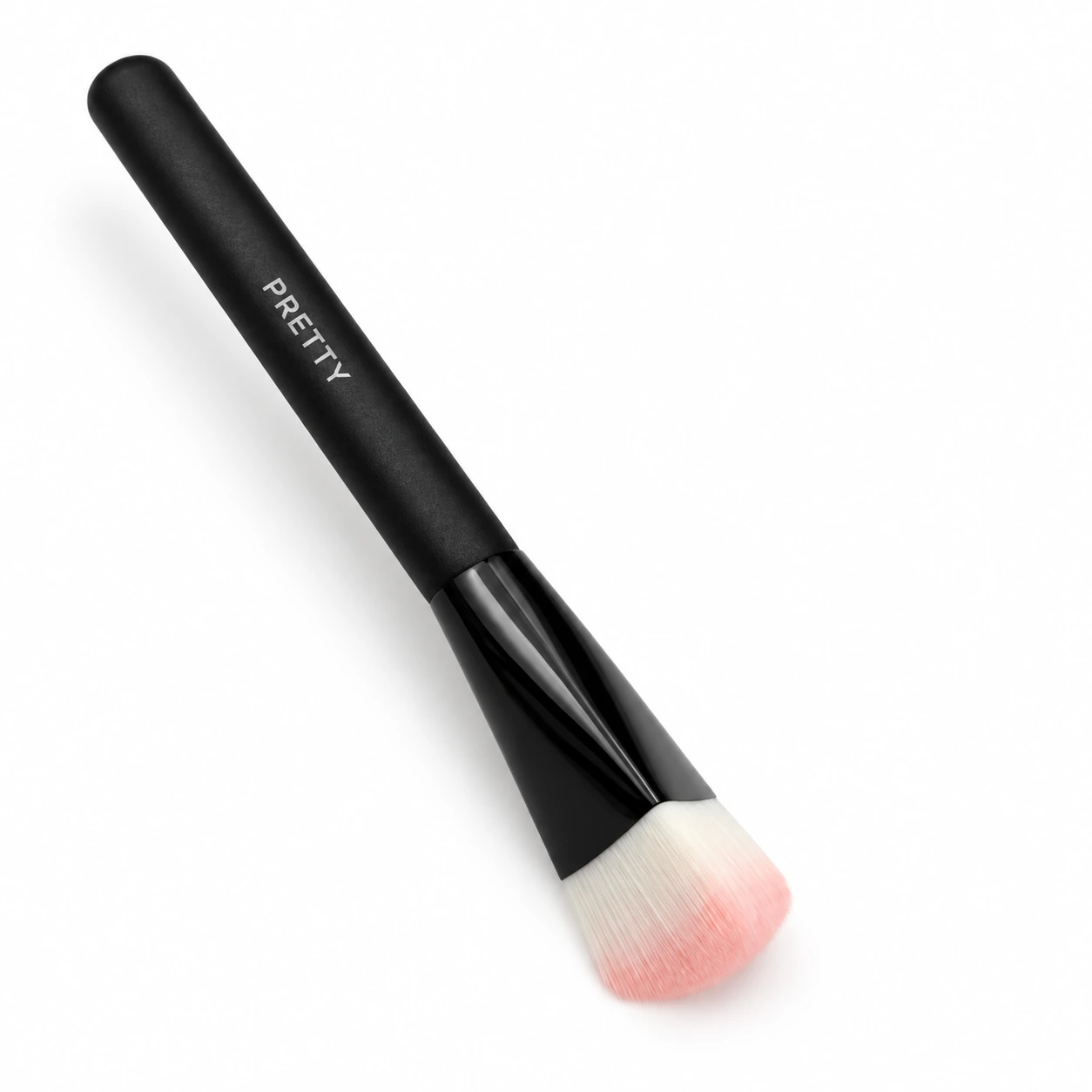 Black handle with a rounded pale head and pink tips, produced brush design