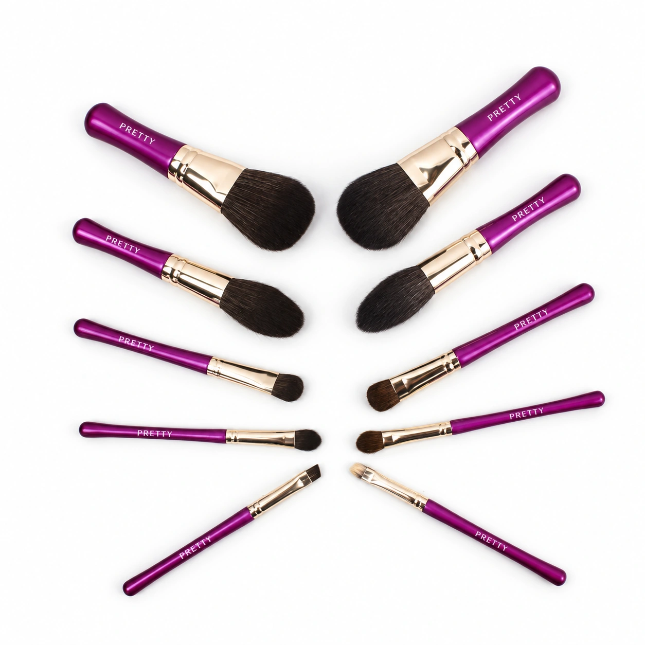 Ten magenta-handle brushes with pale warm-tone ferrules, produced brush design