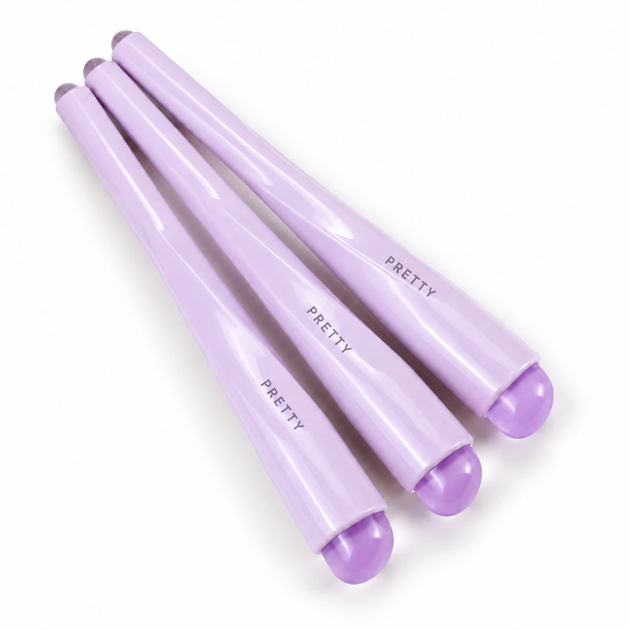 Three lavender applicators showing their rounded ends, produced brush design