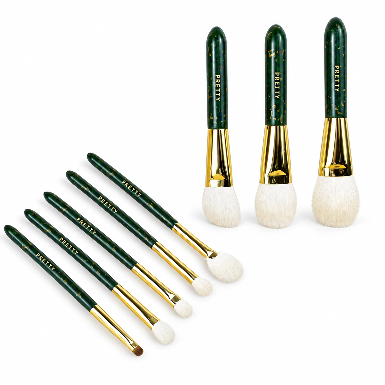 Dark-green patterned brush collection with gold-tone ferrules, a factory reference