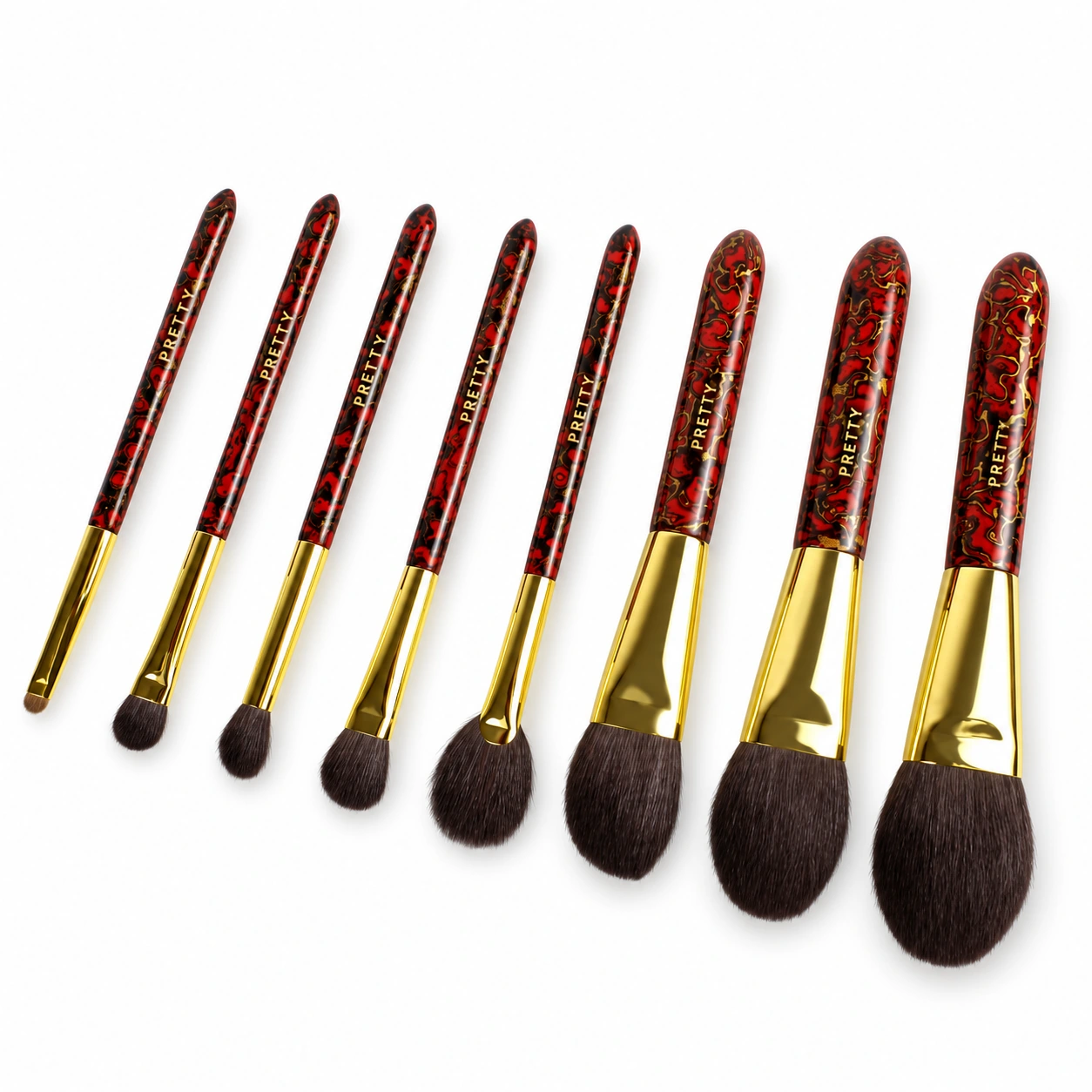 Eight red-and-black patterned brushes with gold-tone ferrules, a supplied factory reference