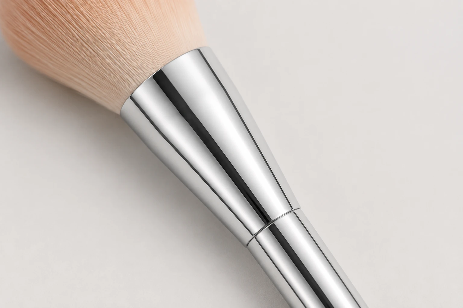 Rounded powder brush concept: tapered silver connection, AI detail visualization