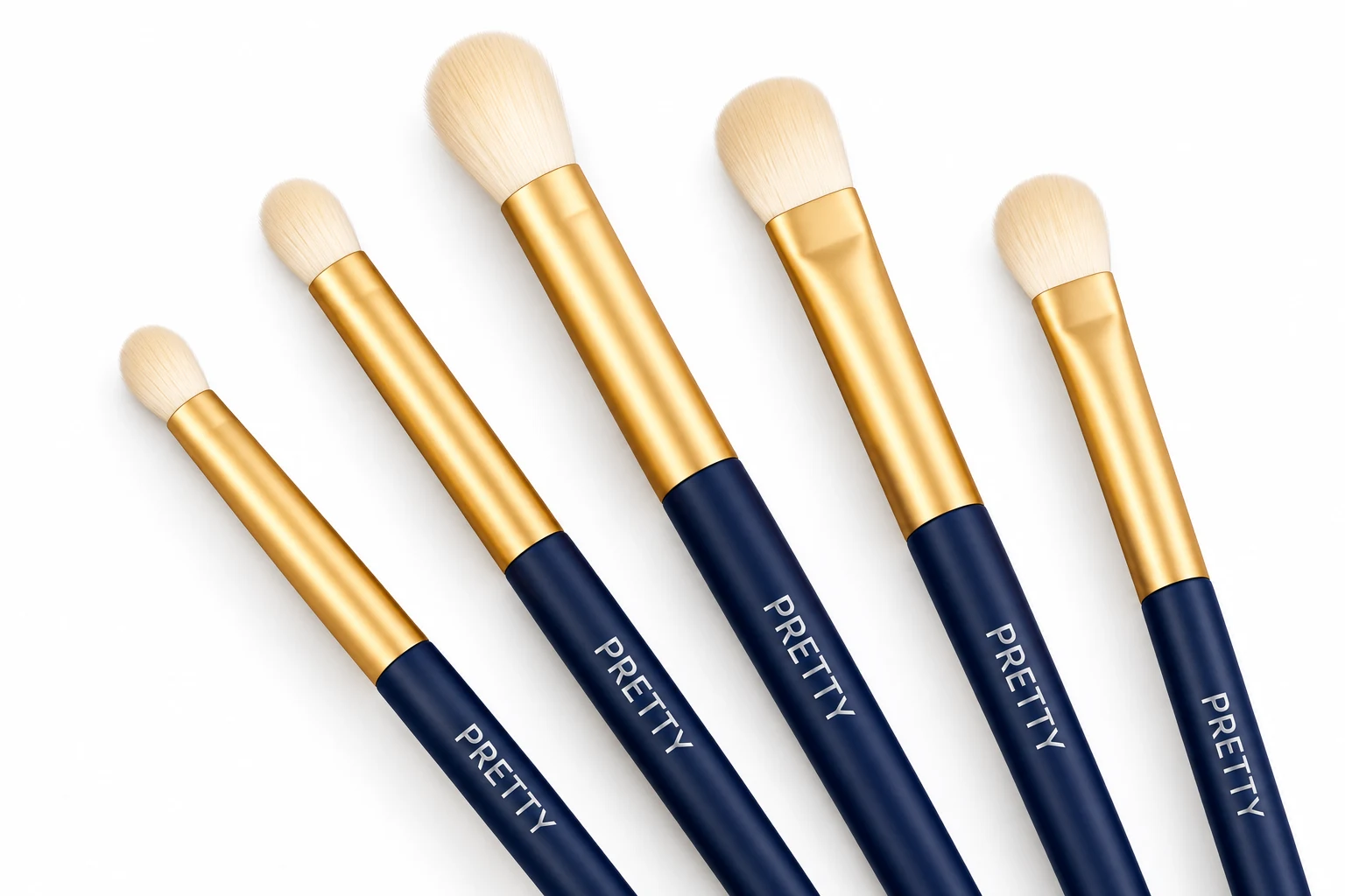 AI detail view of five pale eye-brush profiles with gold-tone ferrules and navy handles