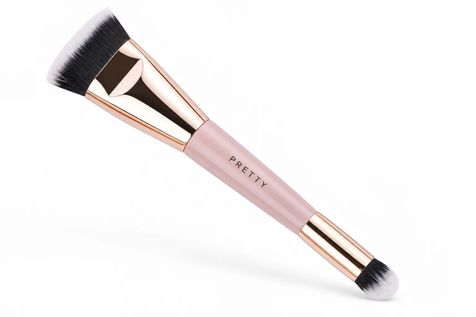 AI three-quarter view showing the large flat and small rounded ends of one pink face brush