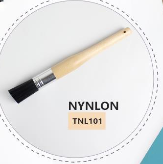 CAT-p052-small-tool: Small pale-handle tool with a dark flat brush section