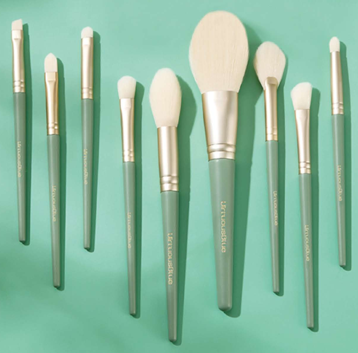 EN-p008-c01: Full nine-brush mint family - Mint green handles, gold-tone ferrules, cream heads
