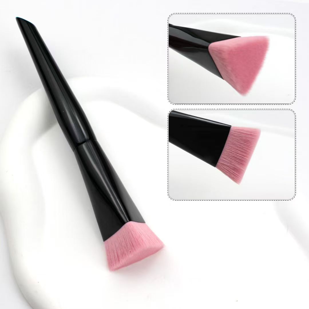 UP028: Pointed black handle with a broad flat pink head