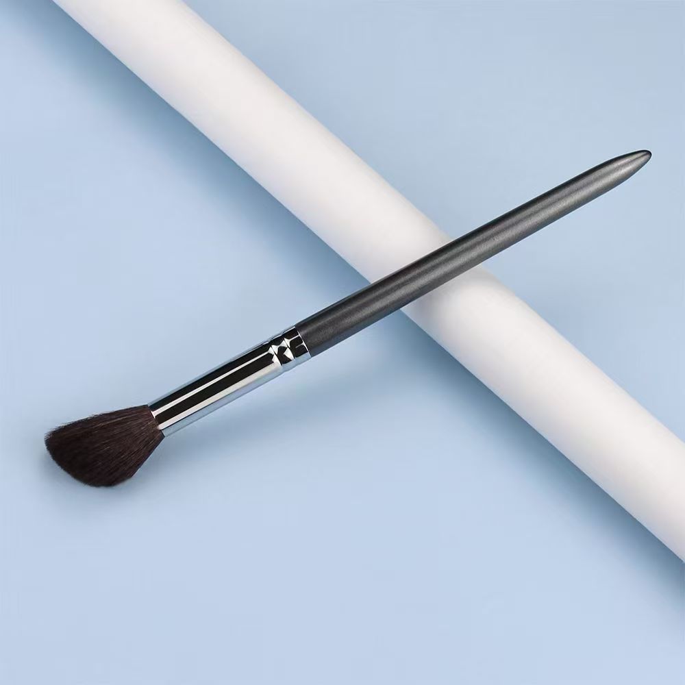 UP057: Gray handle and silver-tone ferrule with a small angled dark head