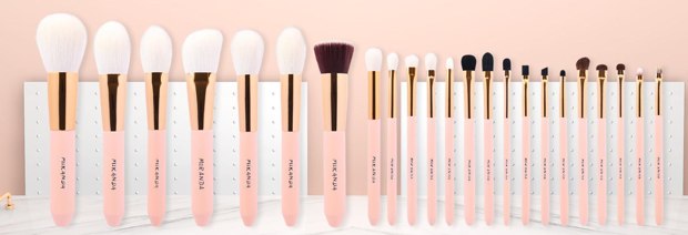 Peach handle gold-tone ferrule brush lineup