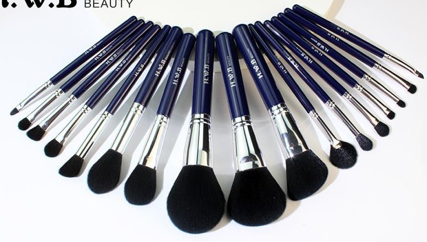 Navy handles silver-tone ferrules dark-bristle fan