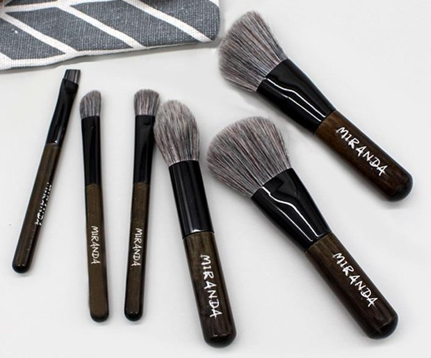 Six dark brown compact travel brushes
