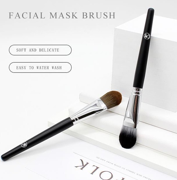 Two black handle silver-tone ferrule face-mask brushes