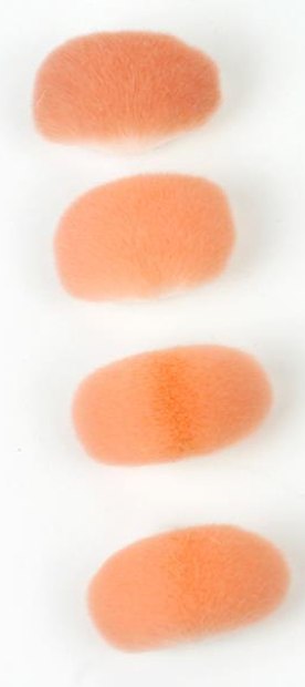 Loose peach-colored brush-head components