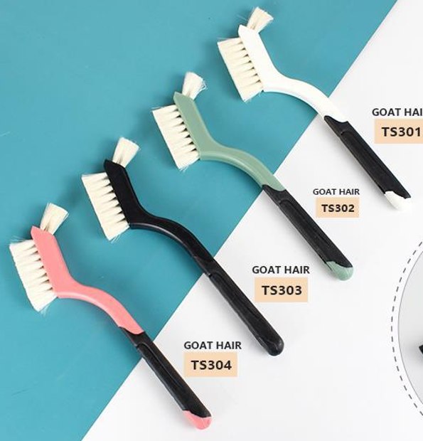 Four fork-shaped tools with narrow brush sections
