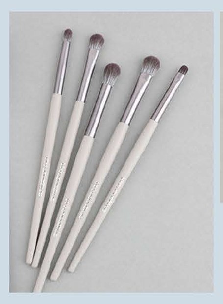 Pale-gray and silver-tone five-brush colorway - Navy, pale gray, or burgundy handle colorways; gold-tone or silver-tone ferrules