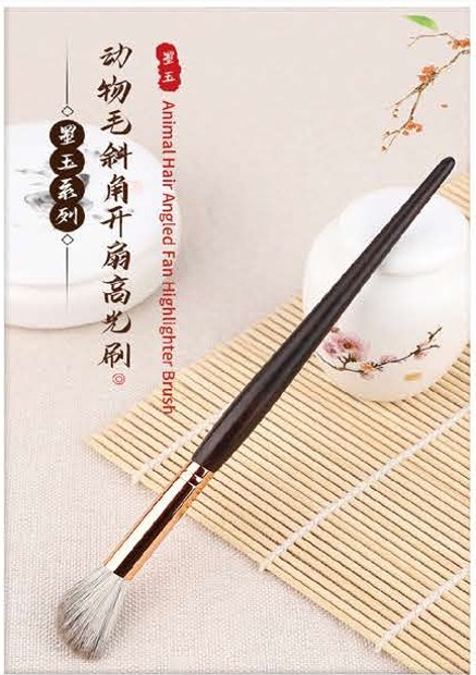 Angled highlight - Dark tapered handles, rose-gold-tone ferrules