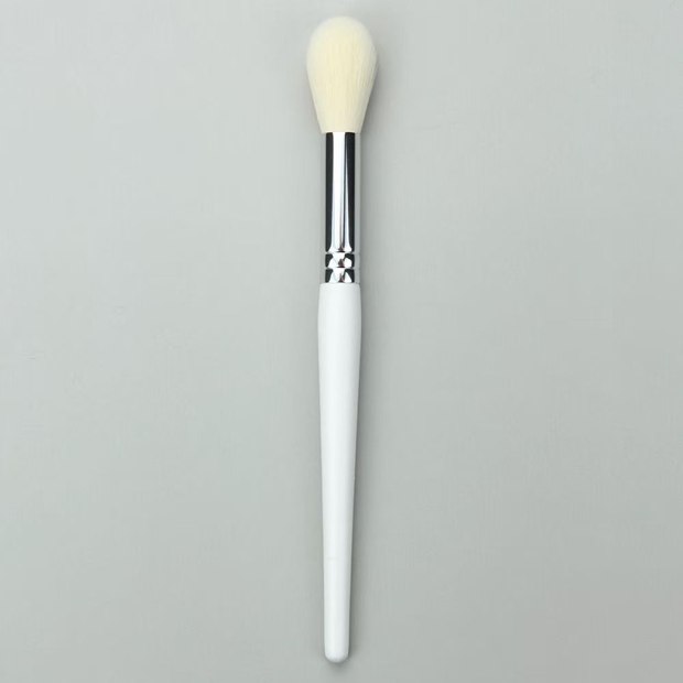 White-handle brush with a slender tapered pale head