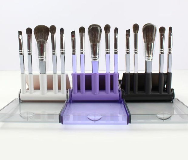 Three five-brush racks with cropped case edges