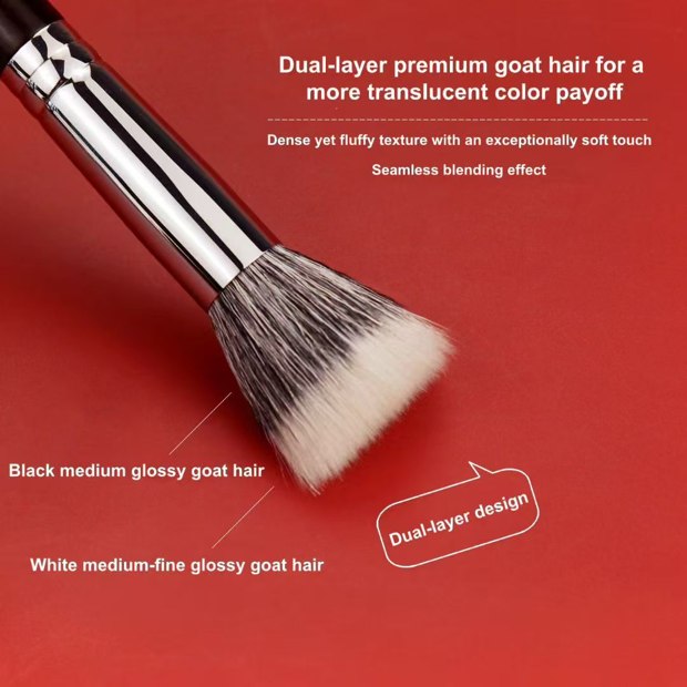 Dark handle and silver-tone ferrule with a gray-white layered head detail
