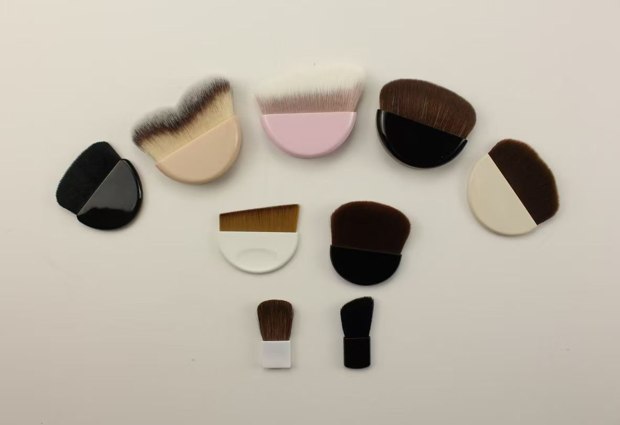 Nine palm-grip and compact brushes with varied bodies