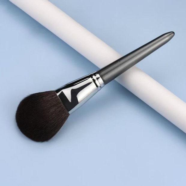 Gray handle and silver-tone ferrule with a large dark rounded head