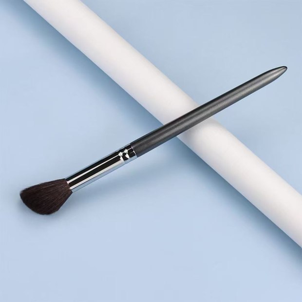 Gray handle and silver-tone ferrule with a small angled dark head