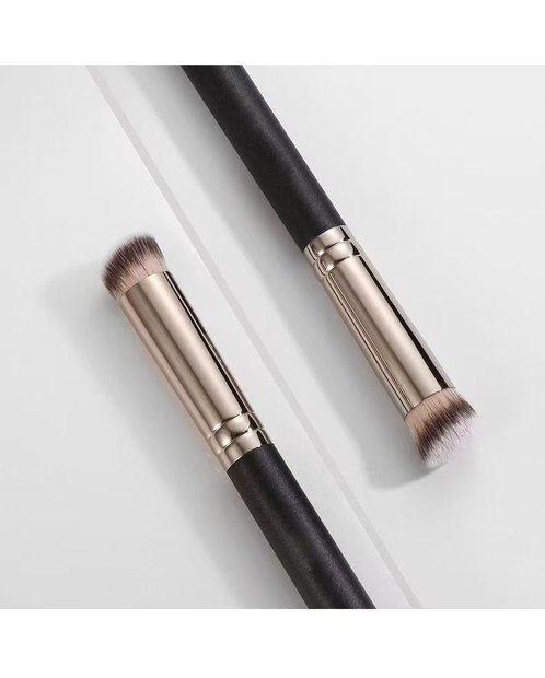 Two cropped dark-handle brushes with short brown-white heads