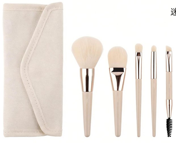 Cream pouch with five pale handle brushes