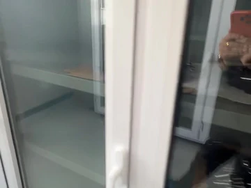 Glass-front workshop cabinet viewed from the side
