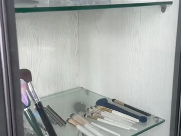 Mixed brush samples inside a glass display cabinet