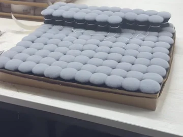 Wider view of the brush-head trays and cartons