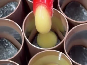 Close view of the dispensing tip and brush body