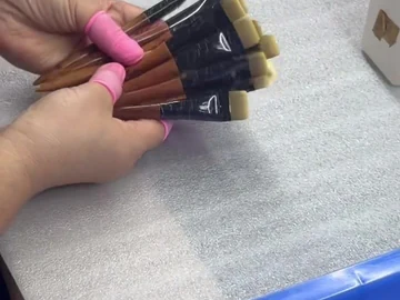 Close view of the pink-handle brush group