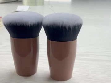 Another angle of the two compact brush samples