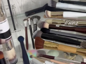 Another view of the glass-shelf brush display