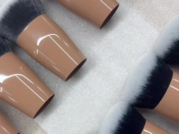Close view of compact brush handles and flat tops