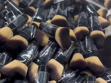 Closer view of the black-and-gold brush group